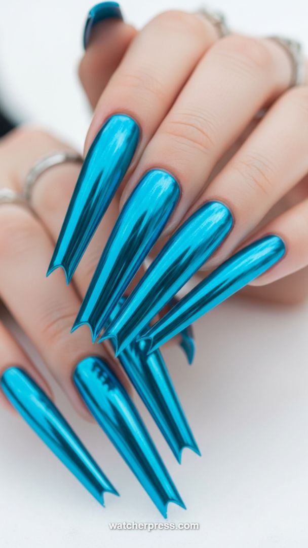 Futuristic Teal Chrome Claws: Extreme Length Mirror Manicure with Notched Tips
