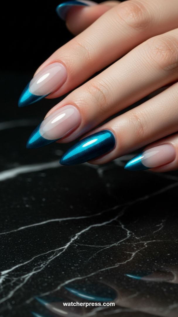 High-Gloss Metallic Teal French Manicure with Stiletto Shape