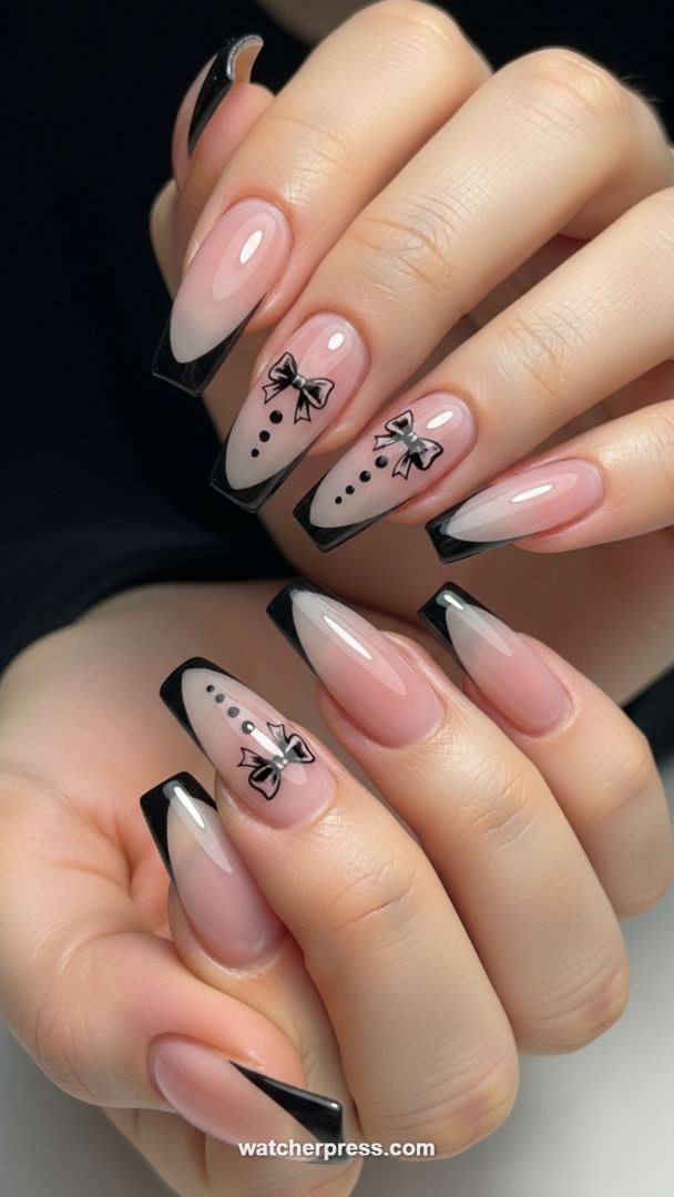 Luxe Black French Coffin Nails with Rhinestone Bow Accents and Tuxedo Detailing