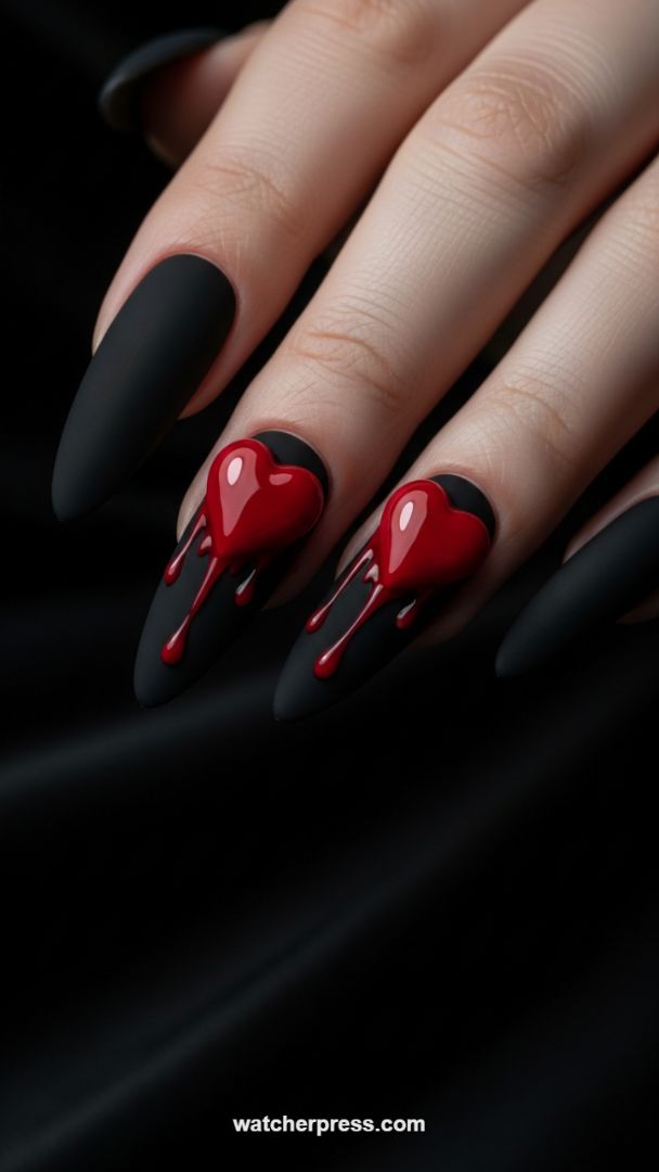 Matte Black Stiletto Nails with 3D Dripping Heart Accents