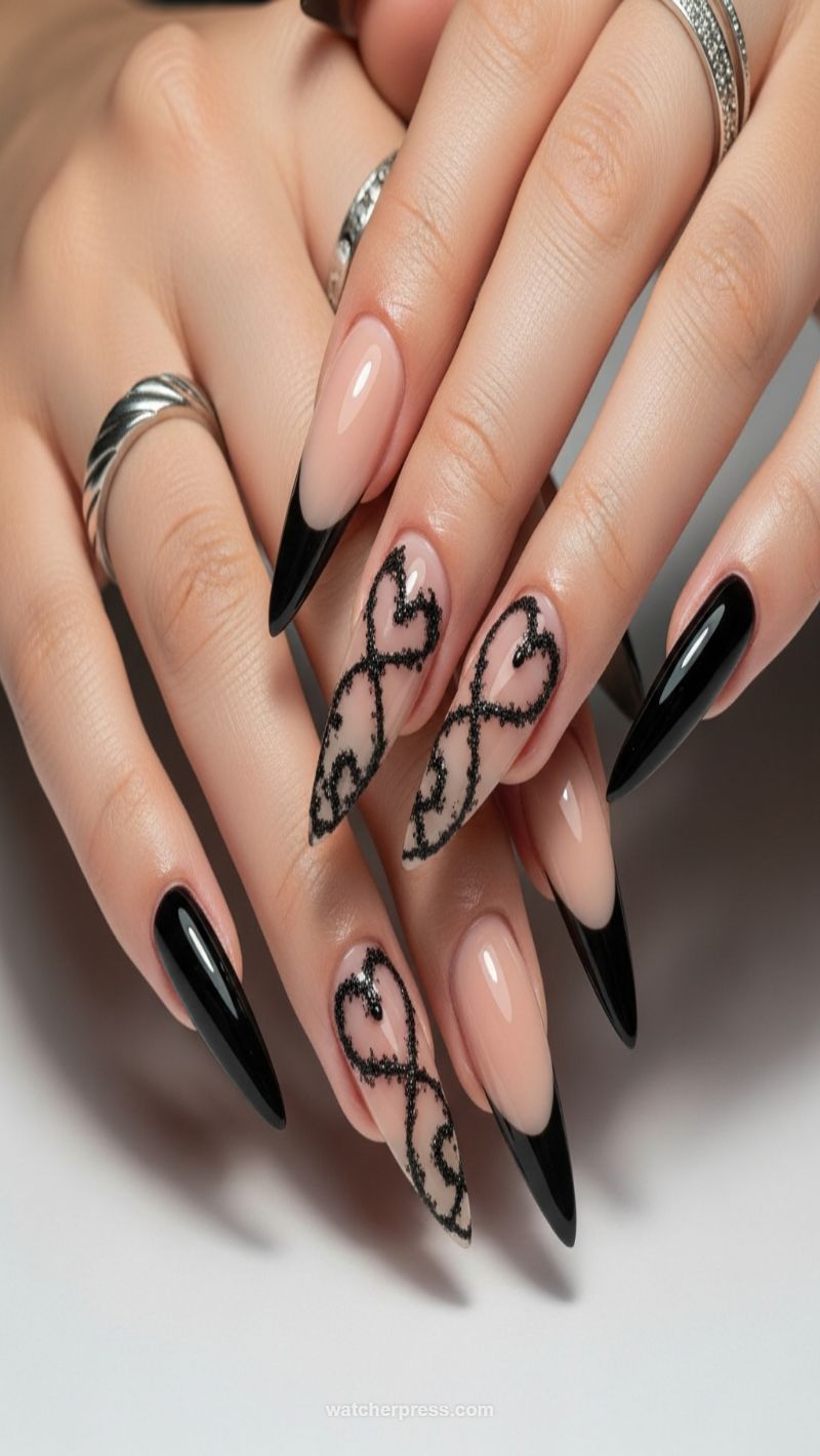 3. Edgy Black French Tips with Lace Hearts
