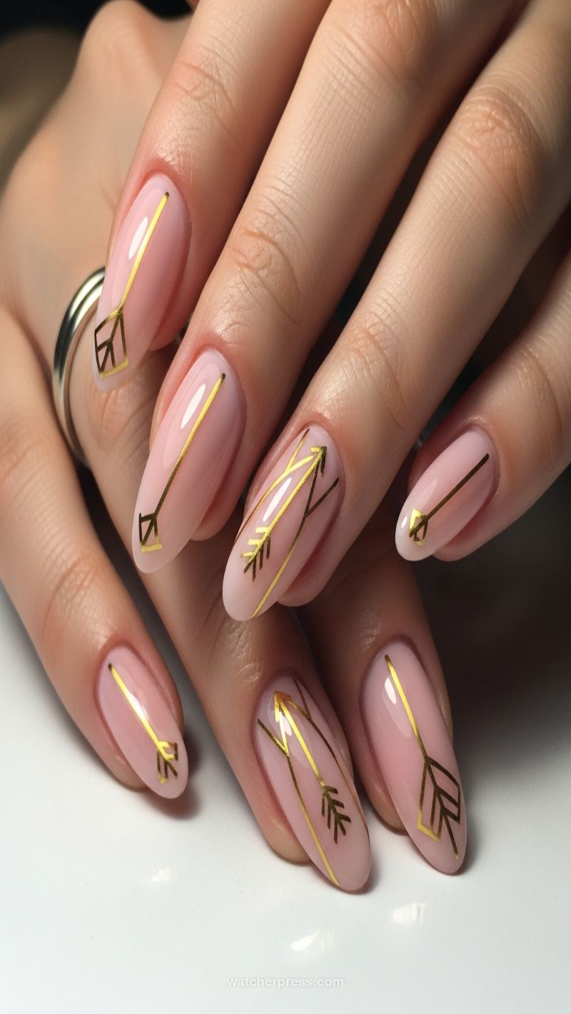 Minimalist Chic: Gold Arrow and Geometric Almond Nails